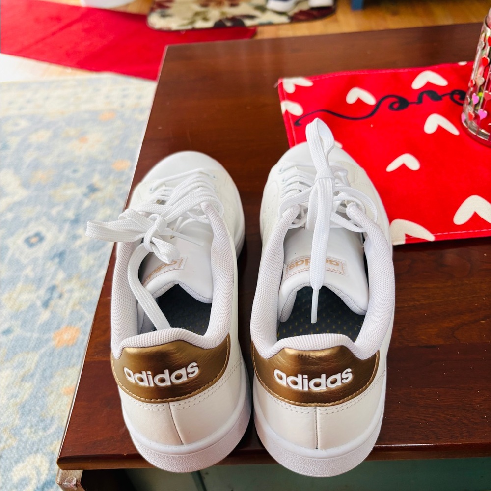 Adidas womens White Sneakers with Gold Accents like new